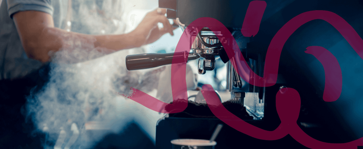 Commercial espresso machine and grinder in a cafe